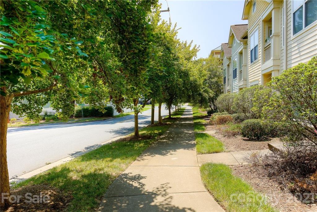 4142 Walker Road Charlotte, NC 28211 - Photo 18 of 18 a view of a street with a building in the background
