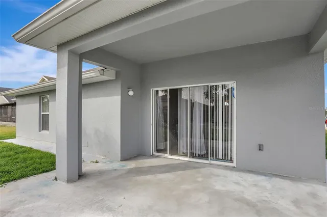 a view of a front door and porch