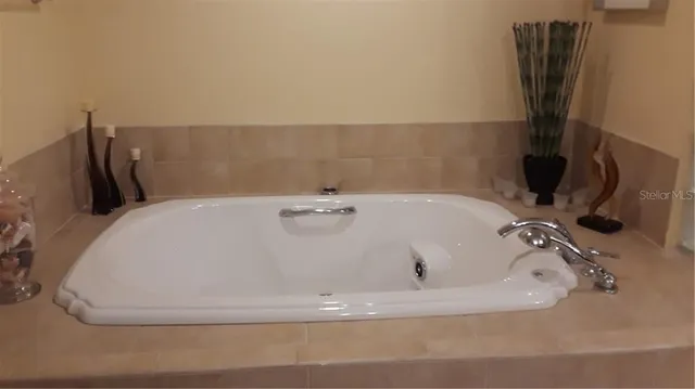 a bath tub sitting in a bathroom