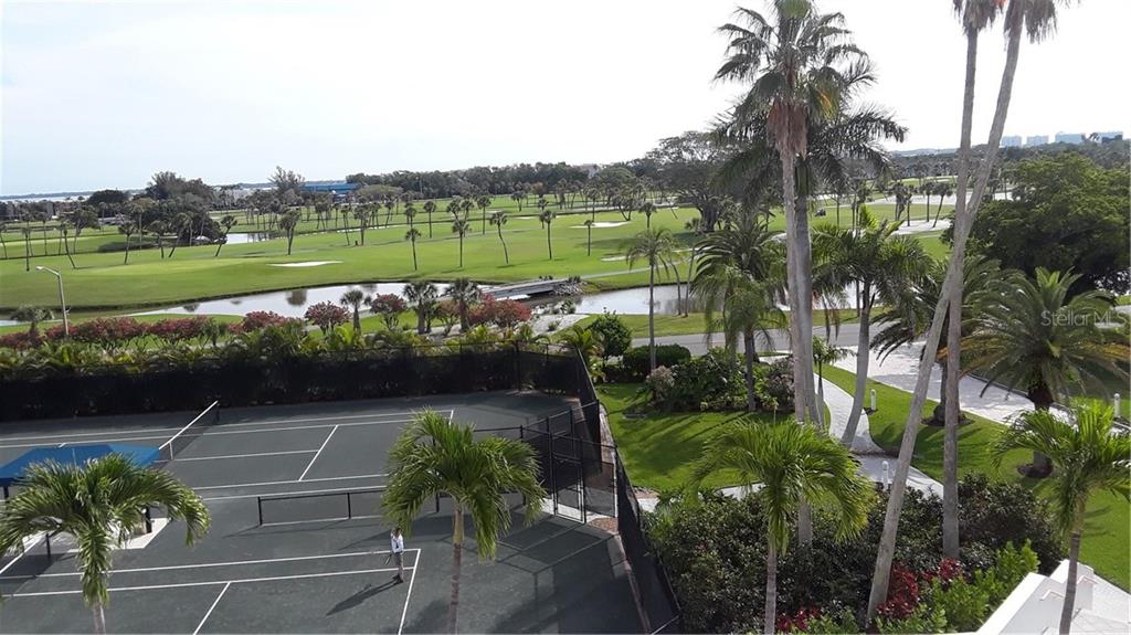 455 Longboat Club Road, Unit 401 Longboat Key, FL 34228 - Photo 27 of 28 a view of a lake with a park