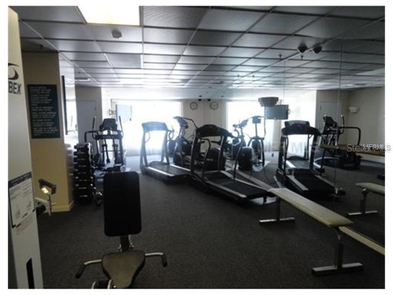 455 Longboat Club Road, Unit 401 Longboat Key, FL 34228 - Photo 28 of 28 a room with gym equipment