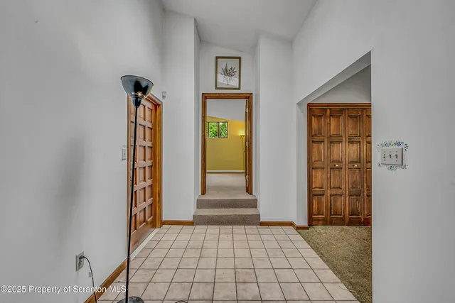 a front view of a livingroom with furniture
