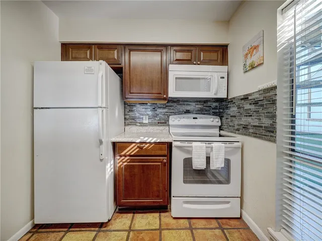 a utility room with washer and dryer