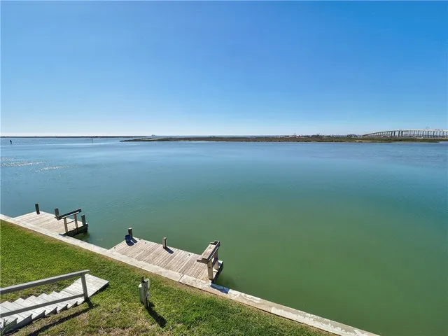 a view of a lake from a balcony