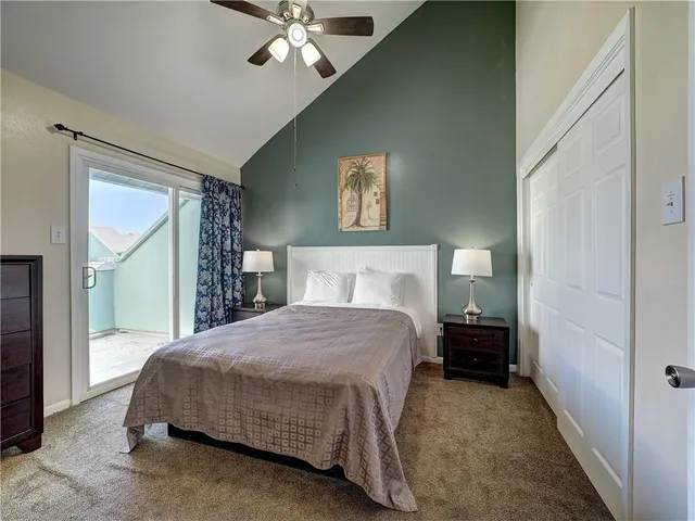 a bathroom with a toilet a sink a tub and mirror