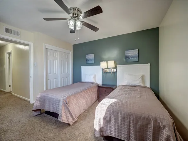 an aerial view of a house with swimming pool