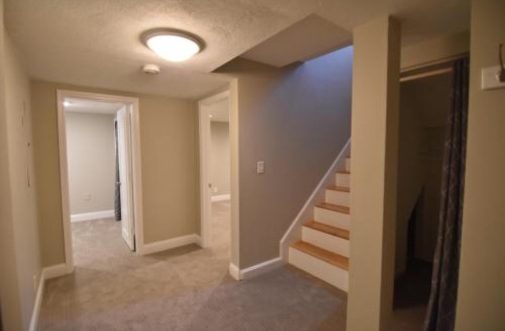 84 Gordon Street, Unit 206 Boston, MA 02135 - Photo 10 of 15 a view of entryway and hall with wooden floor