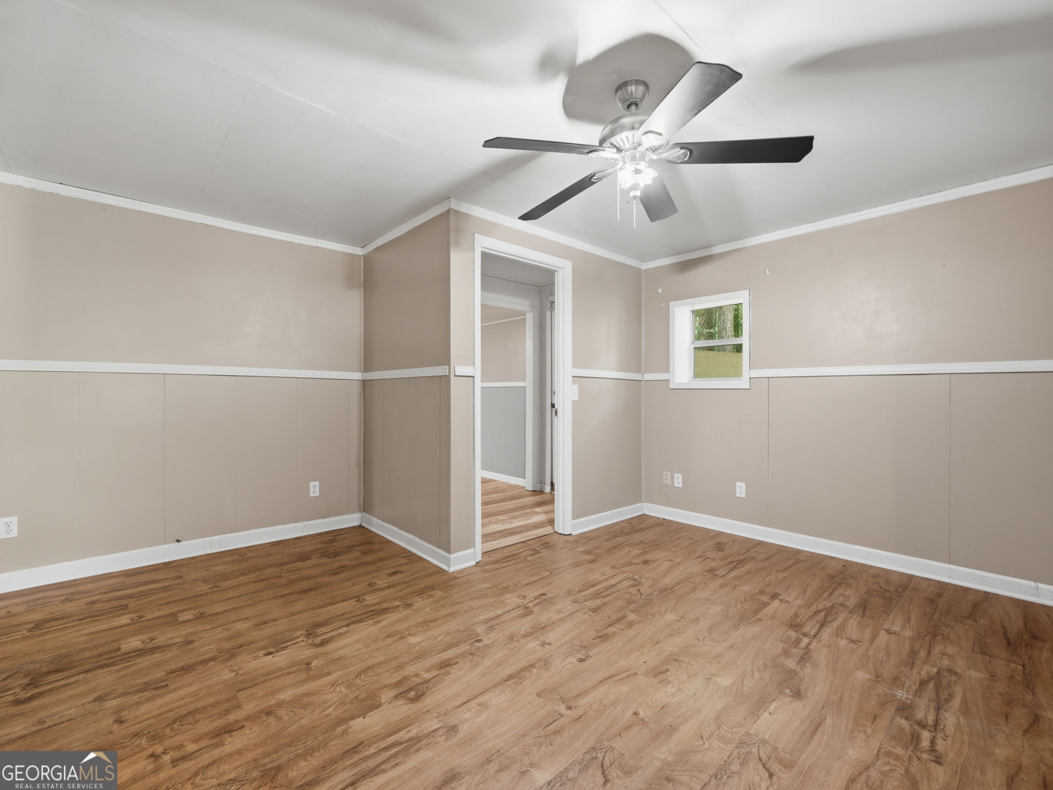 629 Goose Island Road Cherry Log, GA 30522 - Photo 26 of 52 an empty room with fan and windows