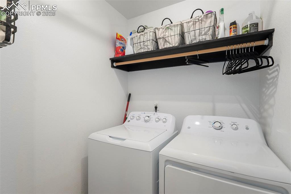 654 Piute Way Como, CO 80432 - Photo 19 of 25 a utility room with dryer and washer