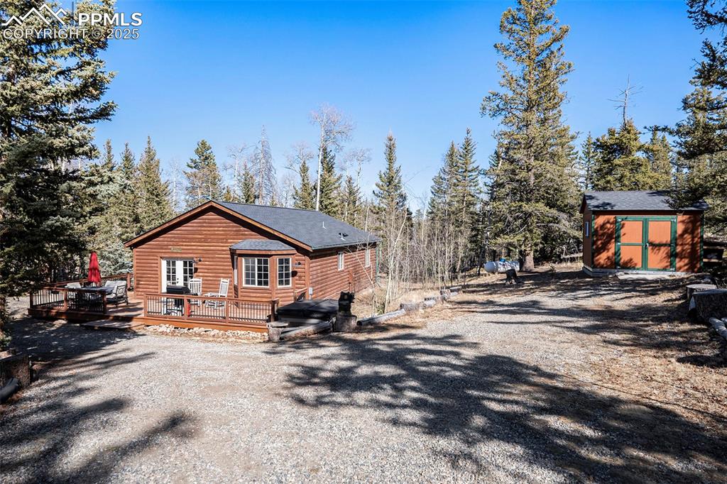 654 Piute Way Como, CO 80432 - Photo 22 of 25 a view of a house with a yard covered in snow