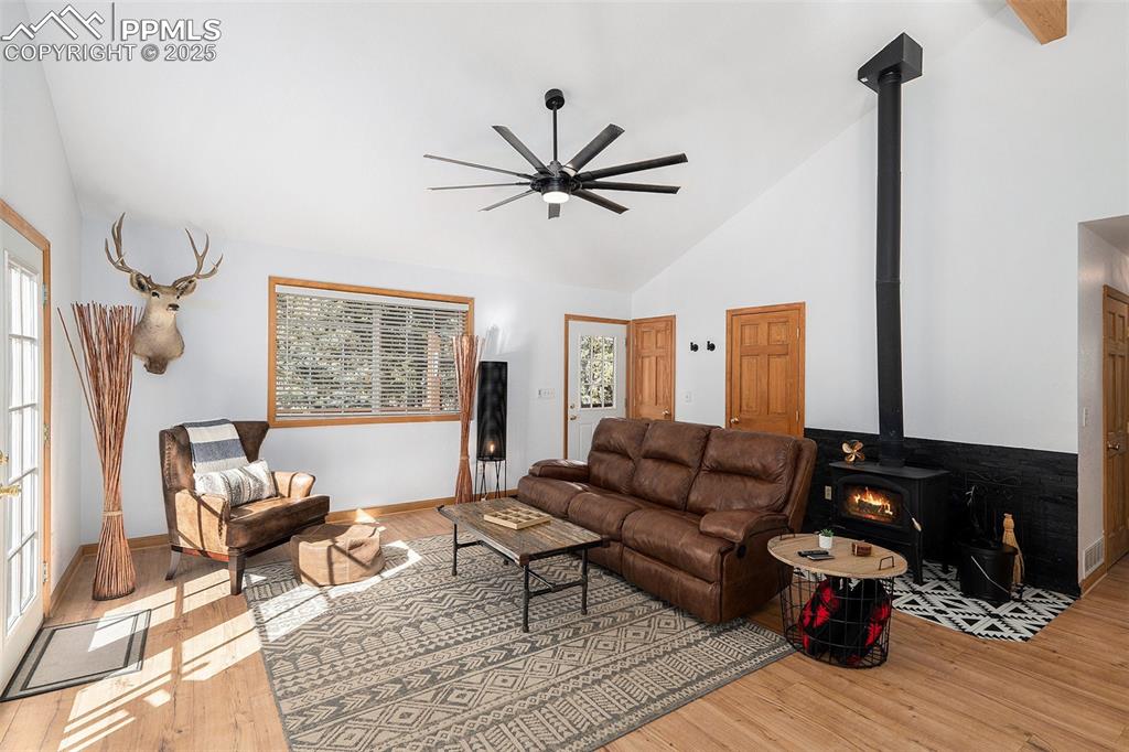 654 Piute Way Como, CO 80432 - Photo 7 of 25 a living room with furniture and wooden floor