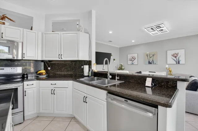 a view of lake with a big yard