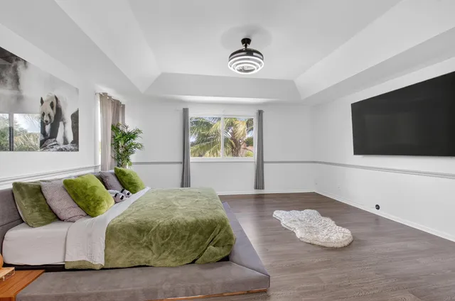 a view of a garden with a building in the background