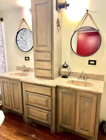 a bathroom with a sink and a mirror