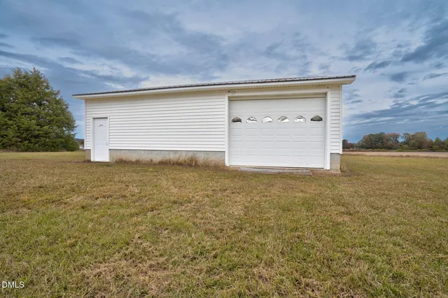 a front view of house with yard
