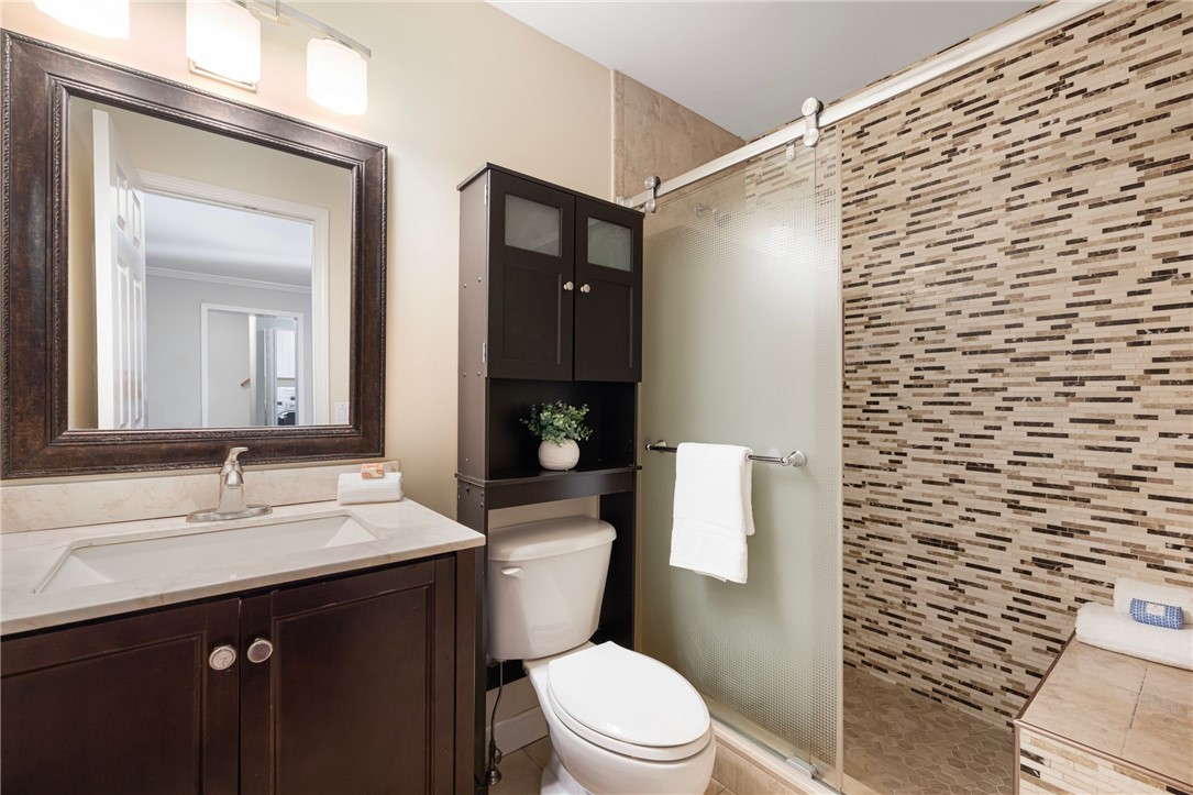 231 Maple Avenue, Unit 204 Newport, RI 02840 - Photo 13 of 40 Bathroom off the open living concept area.