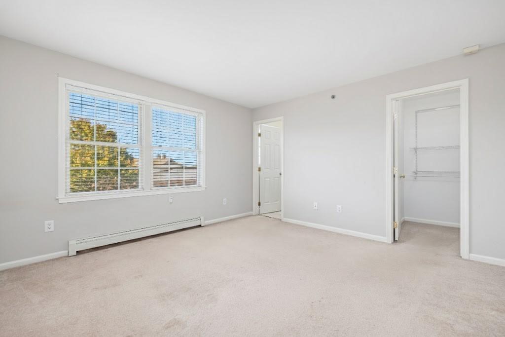 231 Maple Avenue, Unit 204 Newport, RI 02840 - Photo 24 of 40 Ensuite with full bath and walk in closet.