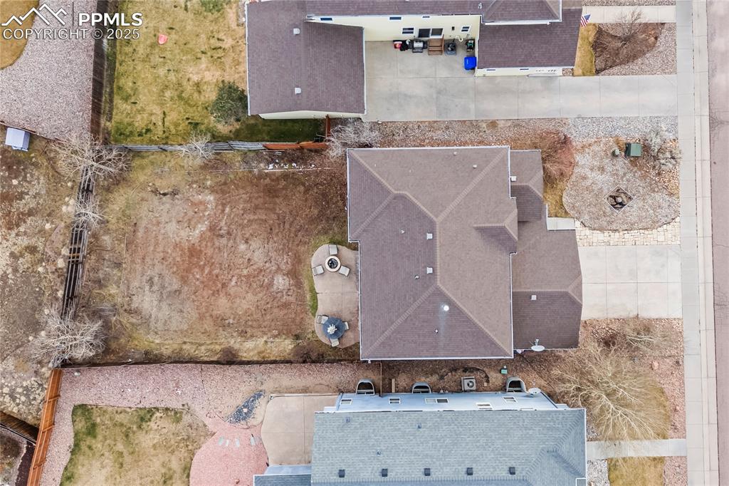 10173 Angeles Road Peyton, CO 80831 - Photo 3 of 50 an aerial view of residential houses with outdoor space