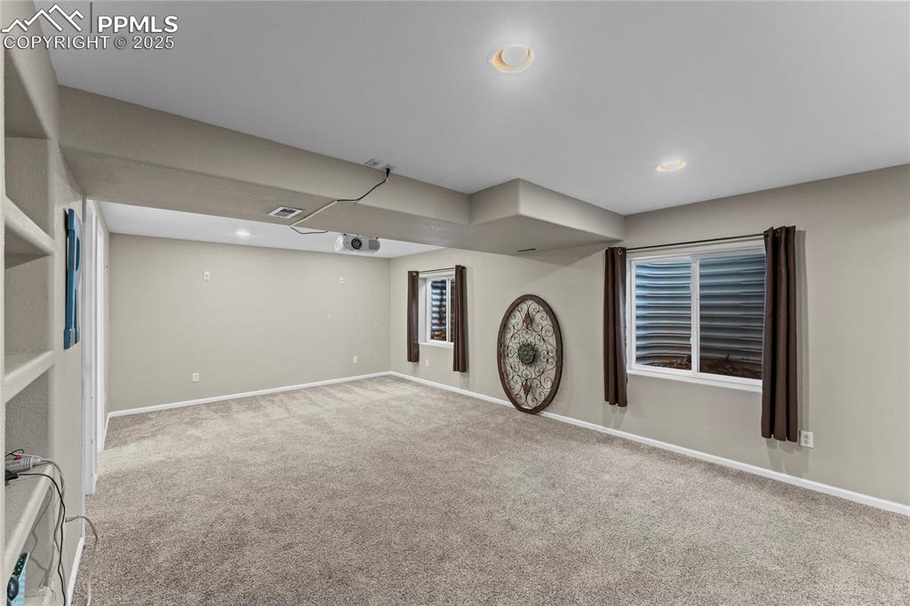 10173 Angeles Road Peyton, CO 80831 - Photo 34 of 50 a view of a hallway with windows