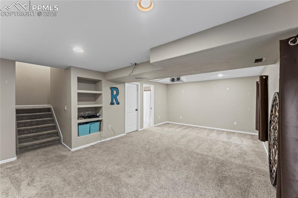 10173 Angeles Road Peyton, CO 80831 - Photo 35 of 50 a view of an empty room with stairs