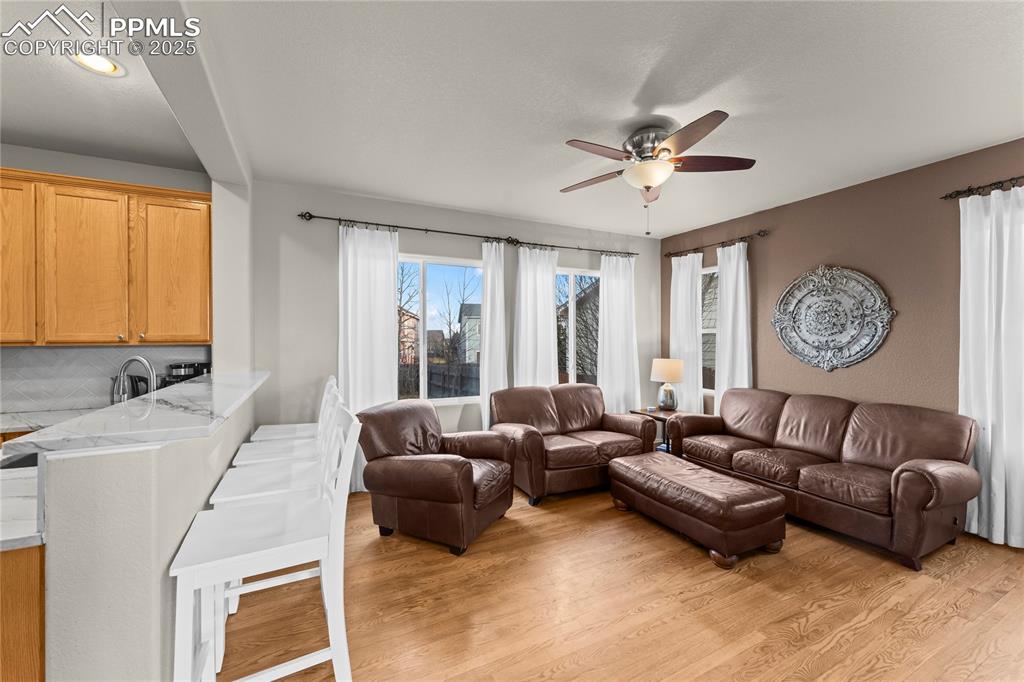 10173 Angeles Road Peyton, CO 80831 - Photo 9 of 50 a living room with furniture and a large window