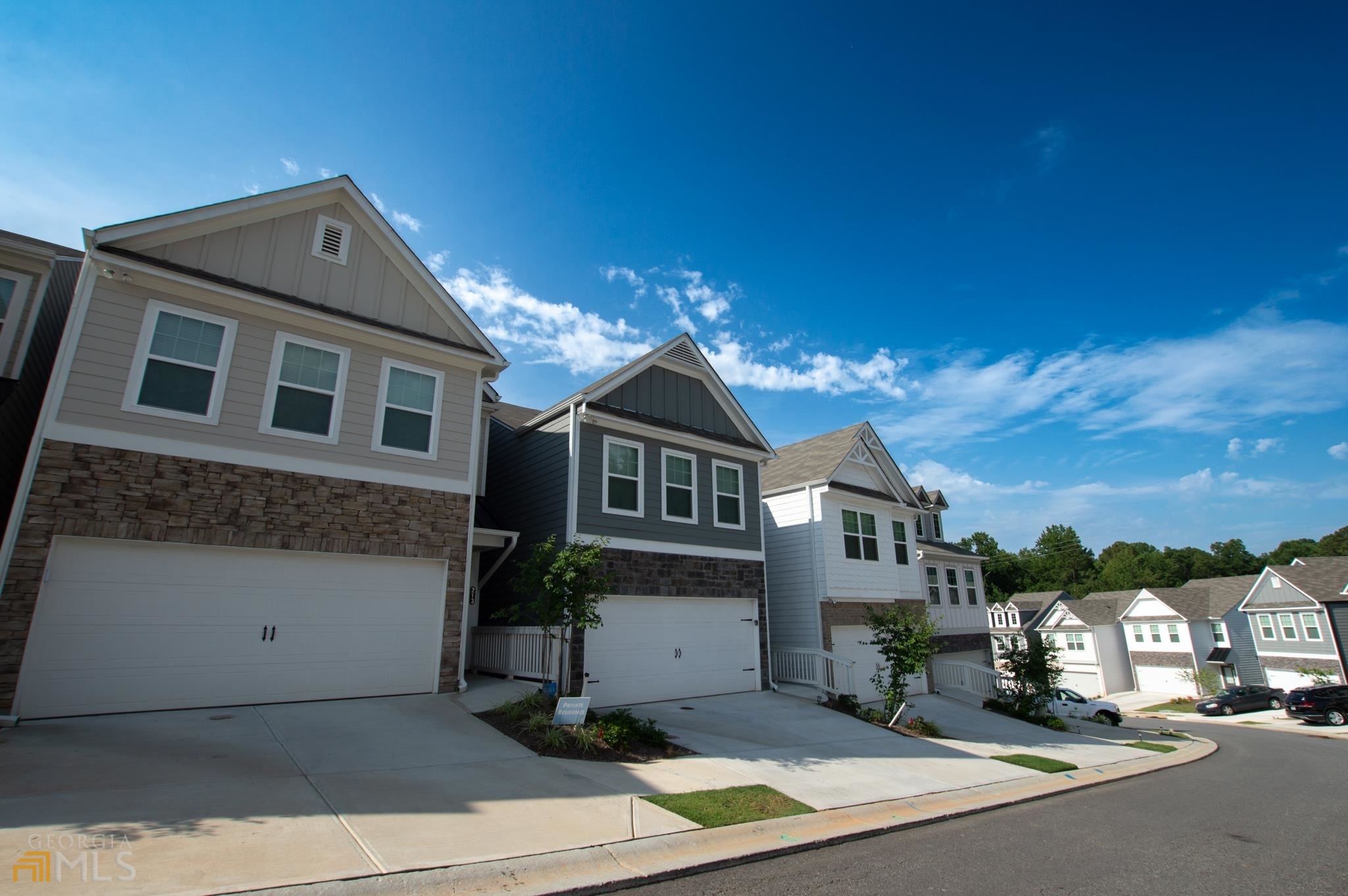 front view of a house with a street