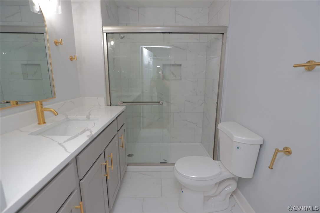 166 Wright Avenue Colonial Heights, VA 23834 - Photo 17 of 50 a bathroom with a granite countertop sink toilet and shower