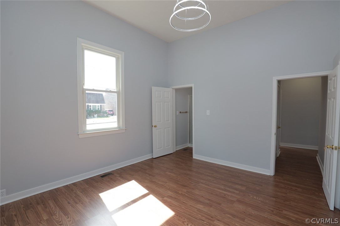 166 Wright Avenue Colonial Heights, VA 23834 - Photo 23 of 50 an empty room with wooden floor and windows