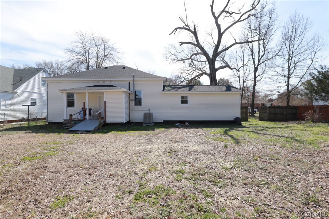 166 Wright Avenue Colonial Heights, VA 23834 - Photo 44 of 50 a view of a house with backyard and a tree
