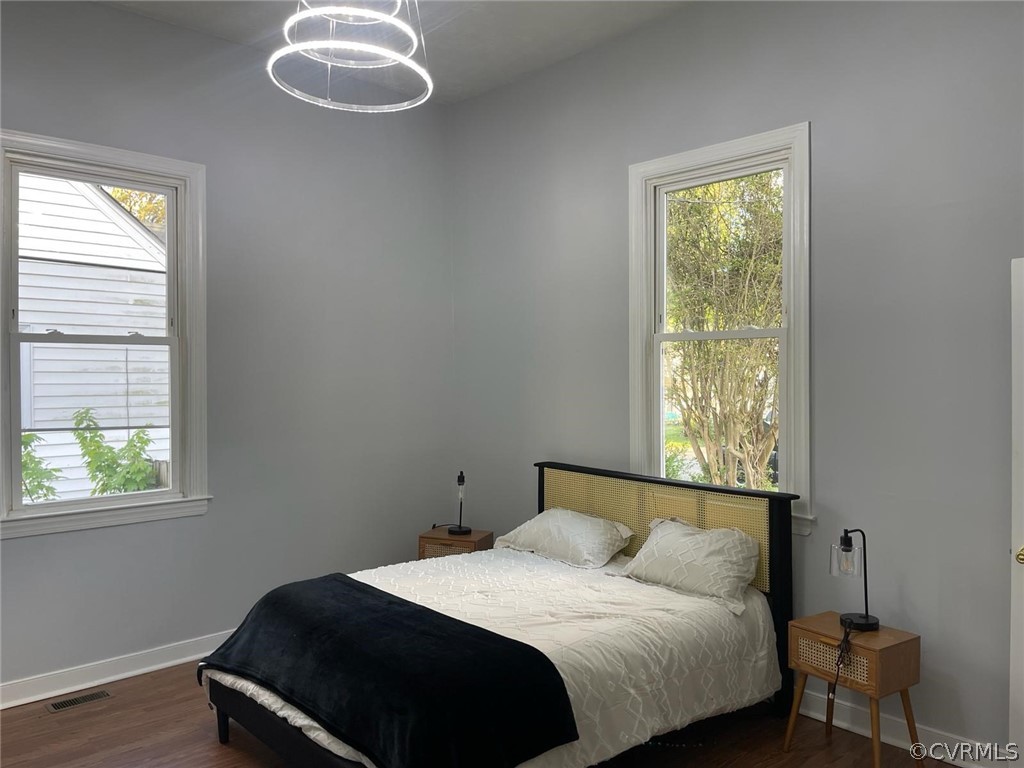 166 Wright Avenue Colonial Heights, VA 23834 - Photo 7 of 50 a bedroom with a bed and a window