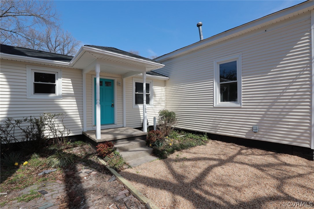 166 Wright Avenue Colonial Heights, VA 23834 - Photo 9 of 50 a front view of a house with garden