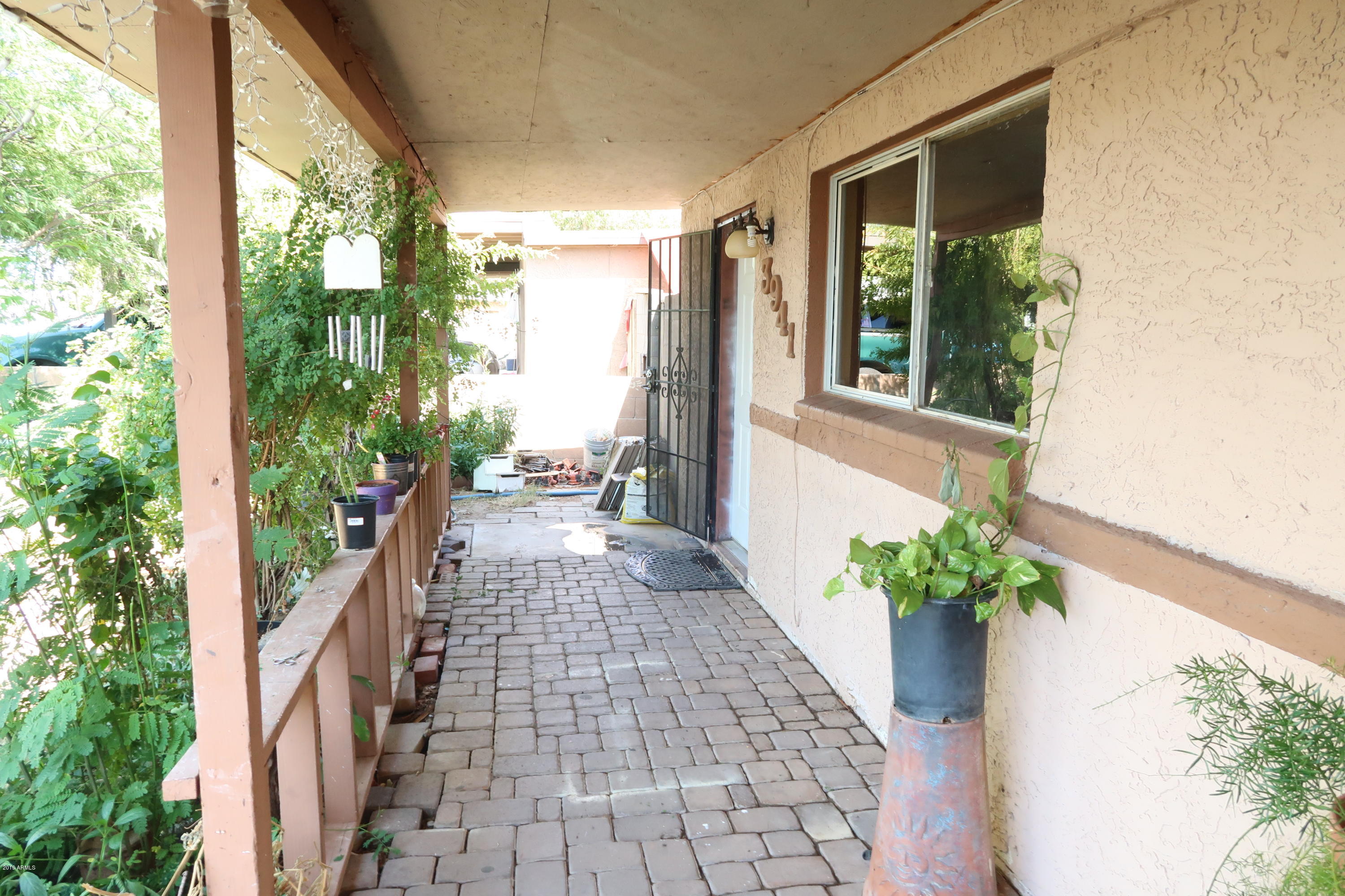 3941 West Monte Vista Road Phoenix, AZ 85009 - Photo 1 of 13 IMG_1198