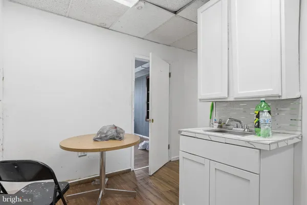 a bathroom with a sink and vanity