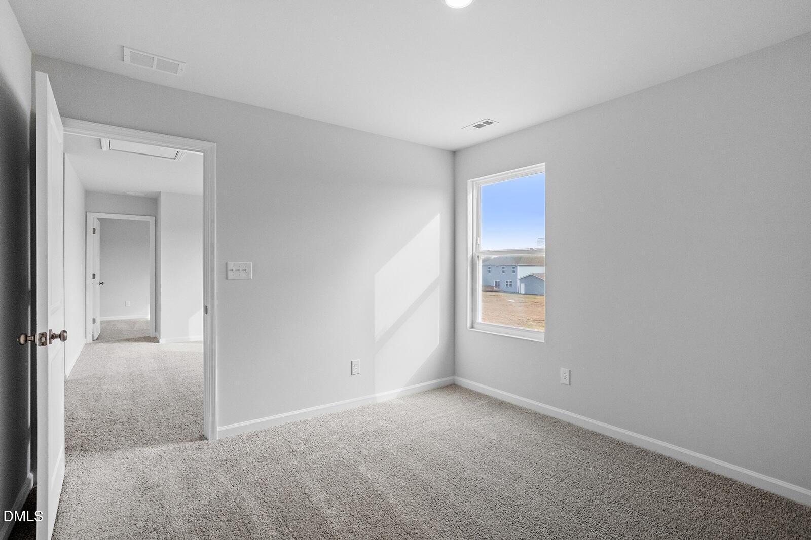79 Osgood Street Angier, NC 27501 - Photo 28 of 31 a view of an empty room with window