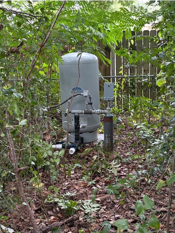 2999 Southwest 90th Place Ocala, FL 34476 - Photo 5 of 13 a bench is sitting in the middle of a forest