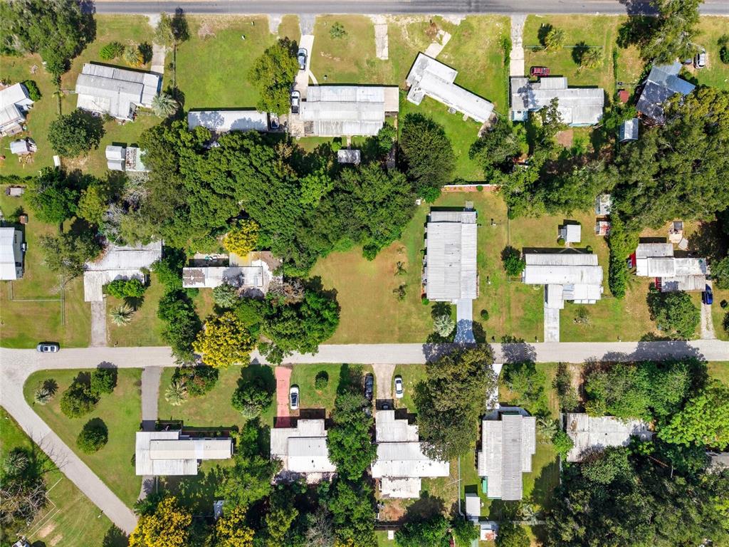2999 Southwest 90th Place Ocala, FL 34476 - Photo 8 of 13 an aerial view of multiple houses with yard