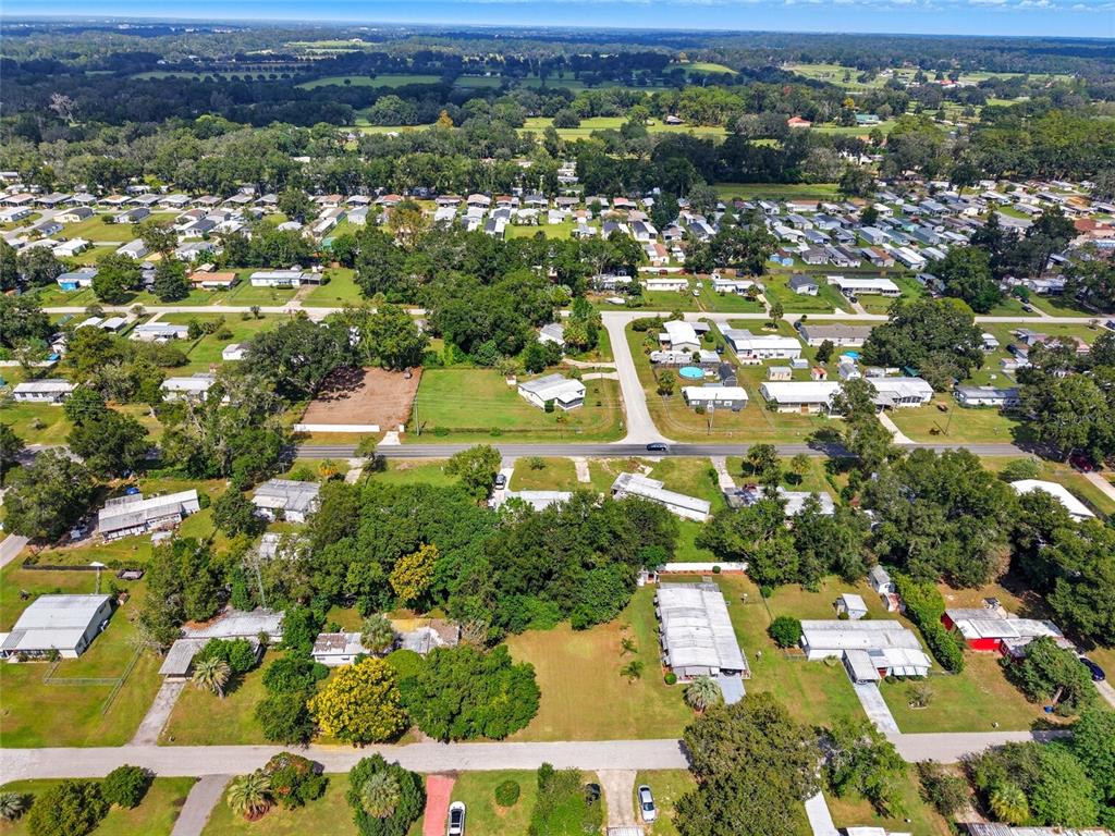 2999 Southwest 90th Place Ocala, FL 34476 - Photo 9 of 13 an aerial view of residential houses with outdoor space