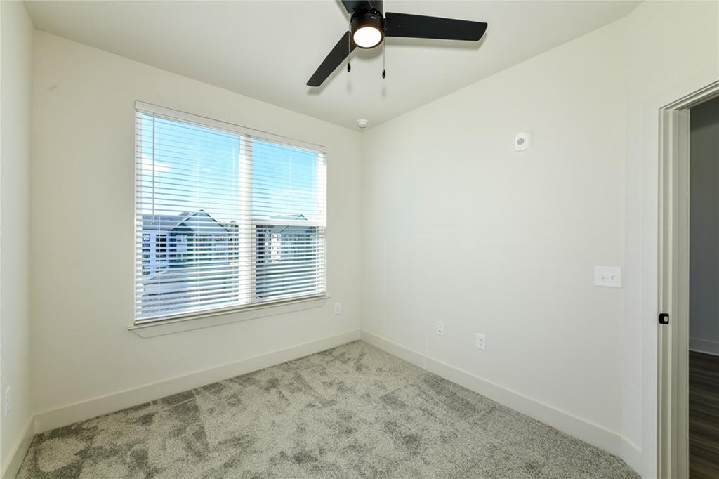 3890 Floyd Road Southwest, Unit THB1 Austell, GA 30106 - Photo 26 of 40 a view of an empty room with a window