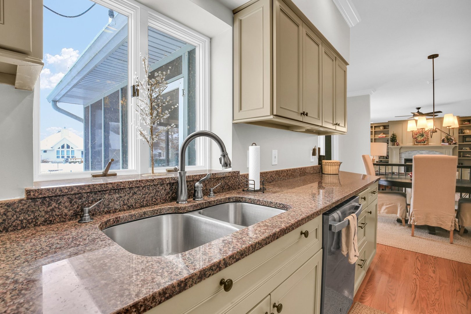 2205 Edgewater Place Champaign, IL 61822 - Photo 22 of 71 a kitchen with stainless steel appliances granite countertop a sink a stove and cabinets