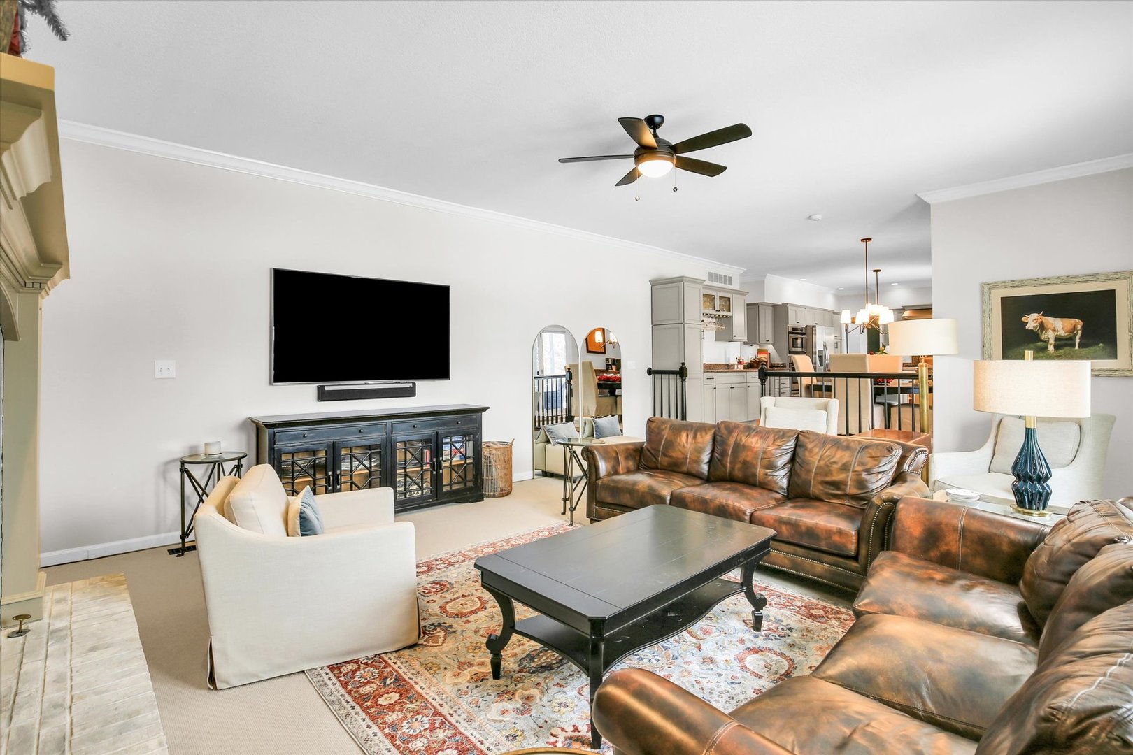 2205 Edgewater Place Champaign, IL 61822 - Photo 29 of 71 a living room with furniture and a flat screen tv