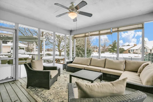 a bedroom with furniture and a window