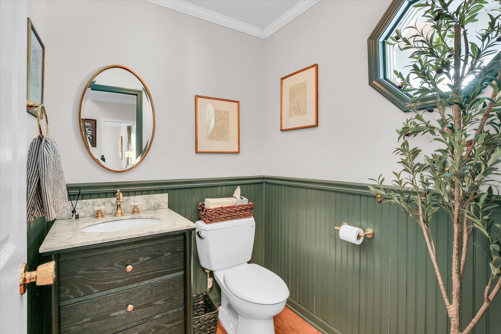 2205 Edgewater Place Champaign, IL 61822 - Photo 31 of 71 a bathroom with a toilet sink vanity and mirror