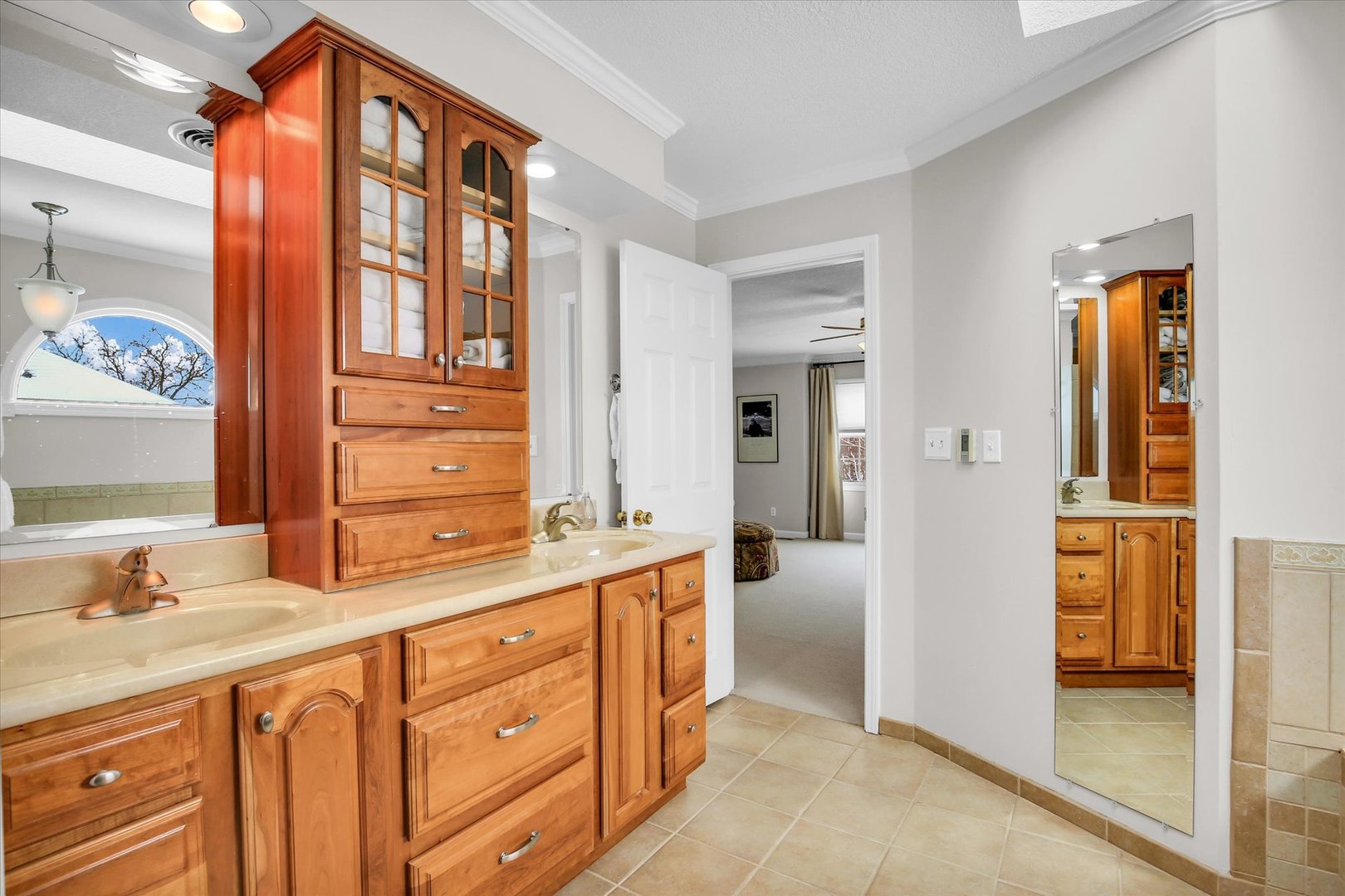 2205 Edgewater Place Champaign, IL 61822 - Photo 40 of 71 a bathroom with a granite countertop sink and a mirror