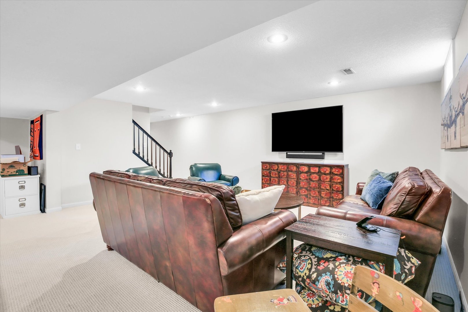 2205 Edgewater Place Champaign, IL 61822 - Photo 51 of 71 a living room with furniture and a flat screen tv