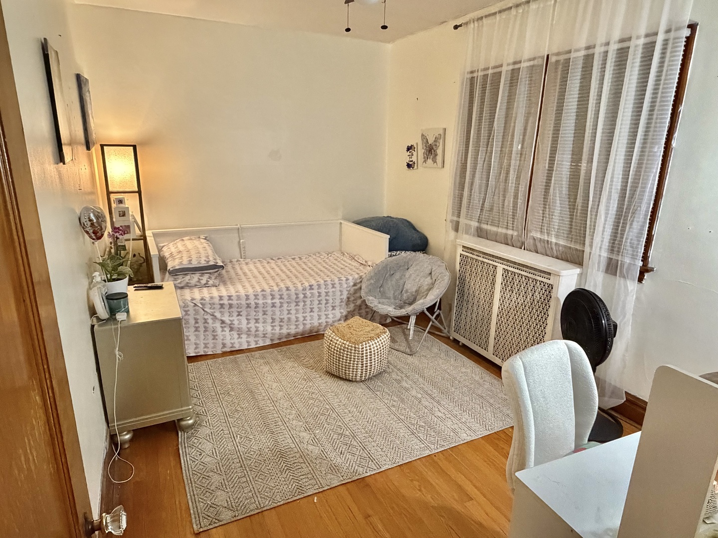 1917 Home Avenue Berwyn, IL 60402 - Photo 4 of 13 a living room with furniture and a window