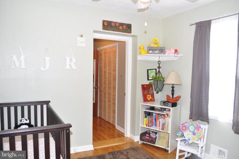 4803 Queensbury Road Riverdale, MD 20737 - Photo 18 of 28 Rear Bedroom
