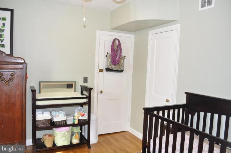 4803 Queensbury Road Riverdale, MD 20737 - Photo 19 of 28 Rear Bedroom