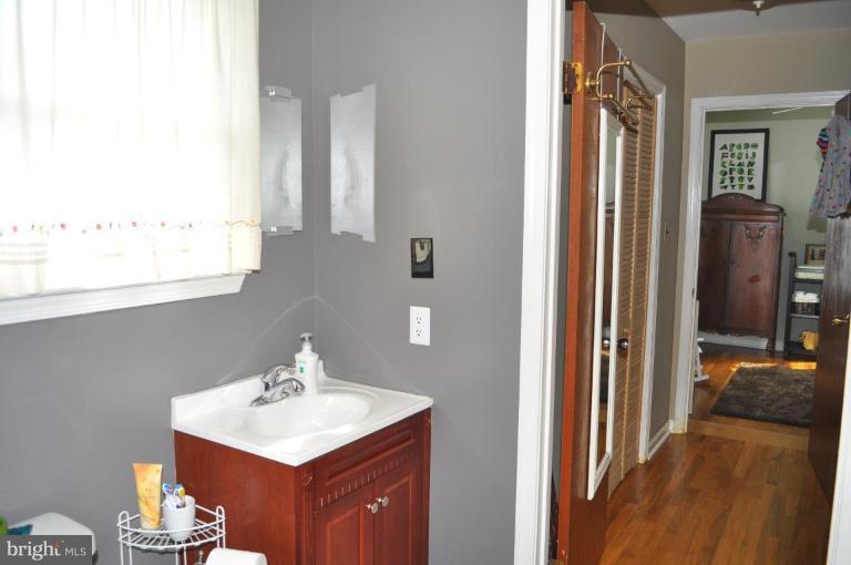 4803 Queensbury Road Riverdale, MD 20737 - Photo 24 of 28 Rear hallway