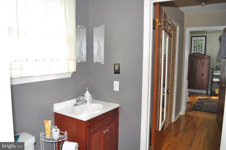 4803 Queensbury Road Riverdale, MD 20737 - Photo 26 of 28 Rear Full Bath
