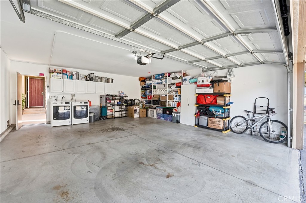 1655 West Lambert Road, Unit G La Habra, CA 90631 - Photo 18 of 21 Large garage with laundry hookups.